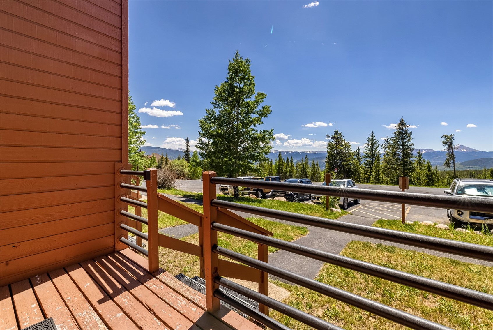 91400 Ryan Gulch Road, Unit 408B Silverthorne, CO 80498 - Photo 11 of 25 a view of a balcony with two chairs