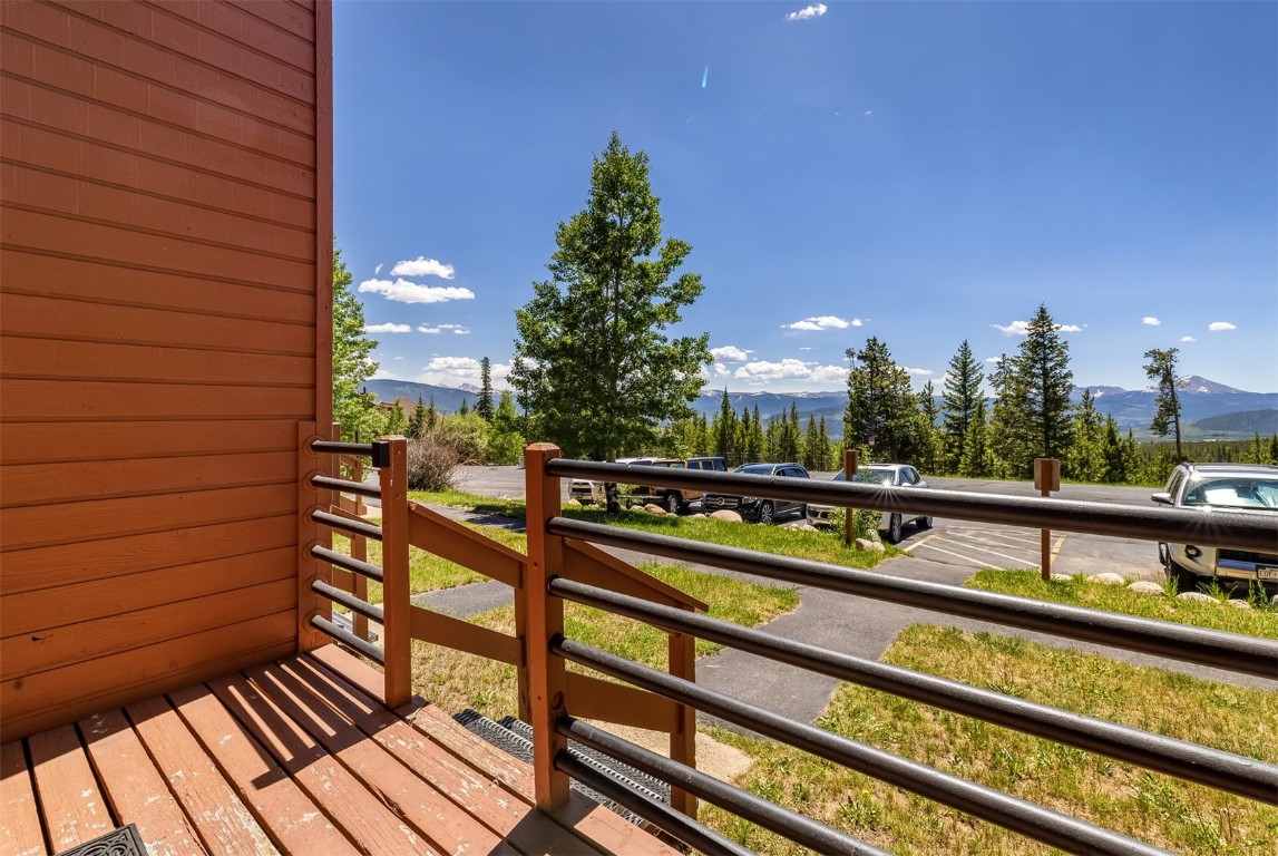 91400 Ryan Gulch Road, Unit 408B Silverthorne, CO 80498 - Photo 13 of 26 a view of a balcony with two chairs