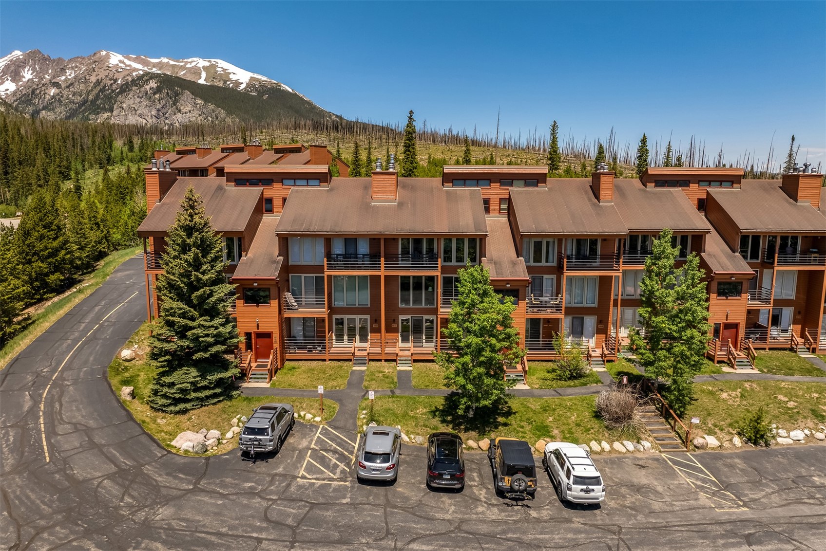 91400 Ryan Gulch Road, Unit 408B Silverthorne, CO 80498 - Photo 14 of 25 a view of a house with swimming pool and sitting area
