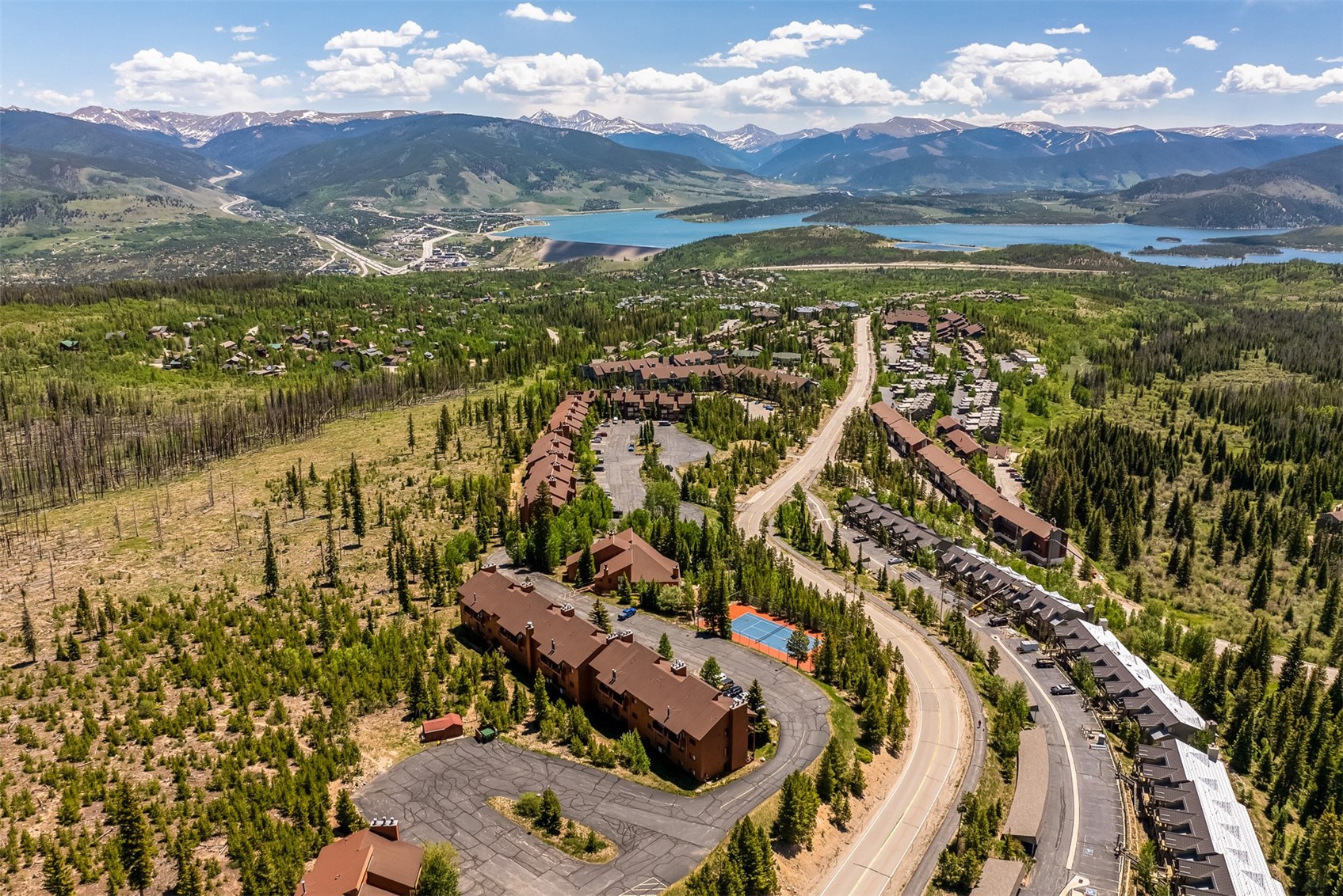 91400 Ryan Gulch Road, Unit 408B Silverthorne, CO 80498 - Photo 22 of 25 a view of a city with mountains in the background