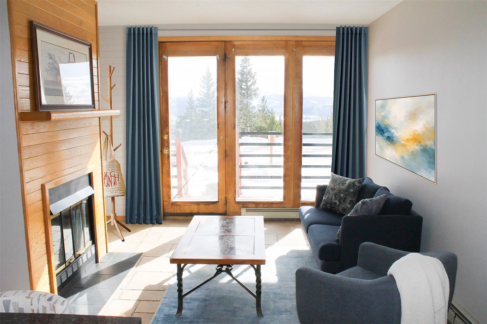 91400 Ryan Gulch Road, Unit 408B Silverthorne, CO 80498 - Photo 10 of 25 a living room with furniture and a window