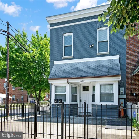 a front view of a house with a porch