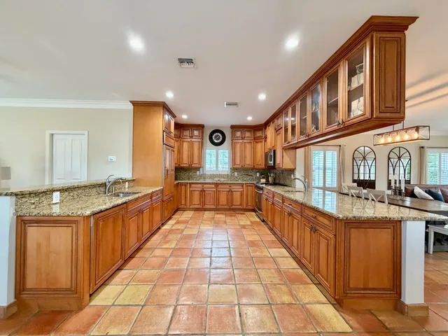 a view of a living room and bathroom