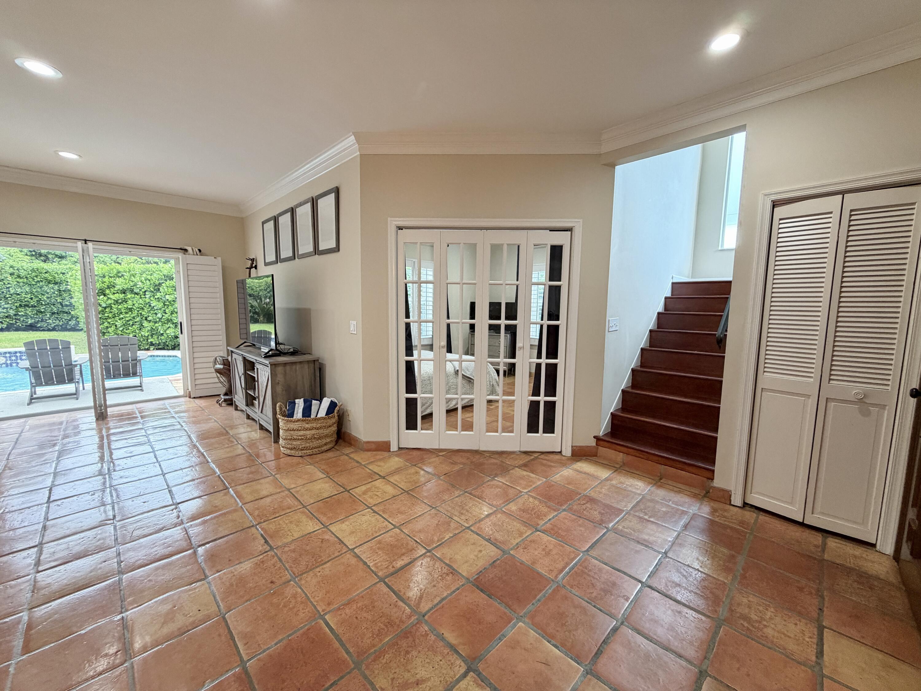 6401 Travis Road West Palm Beach, FL 33406 - Photo 39 of 99 a view of a livingroom with furniture and staircase