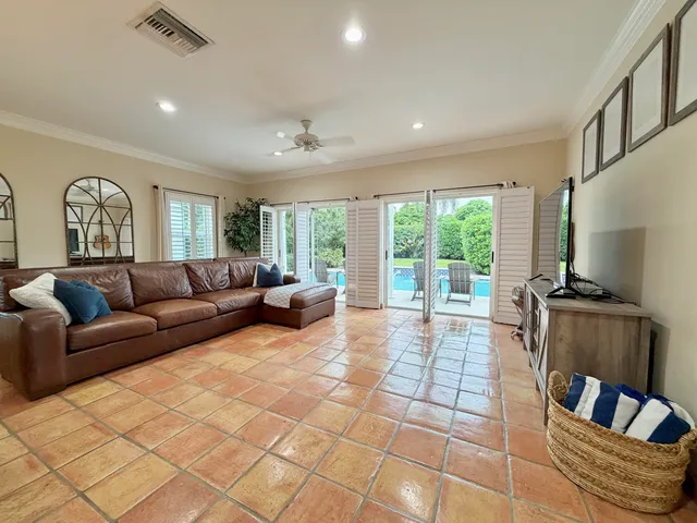 a bed room with a bed and a chair