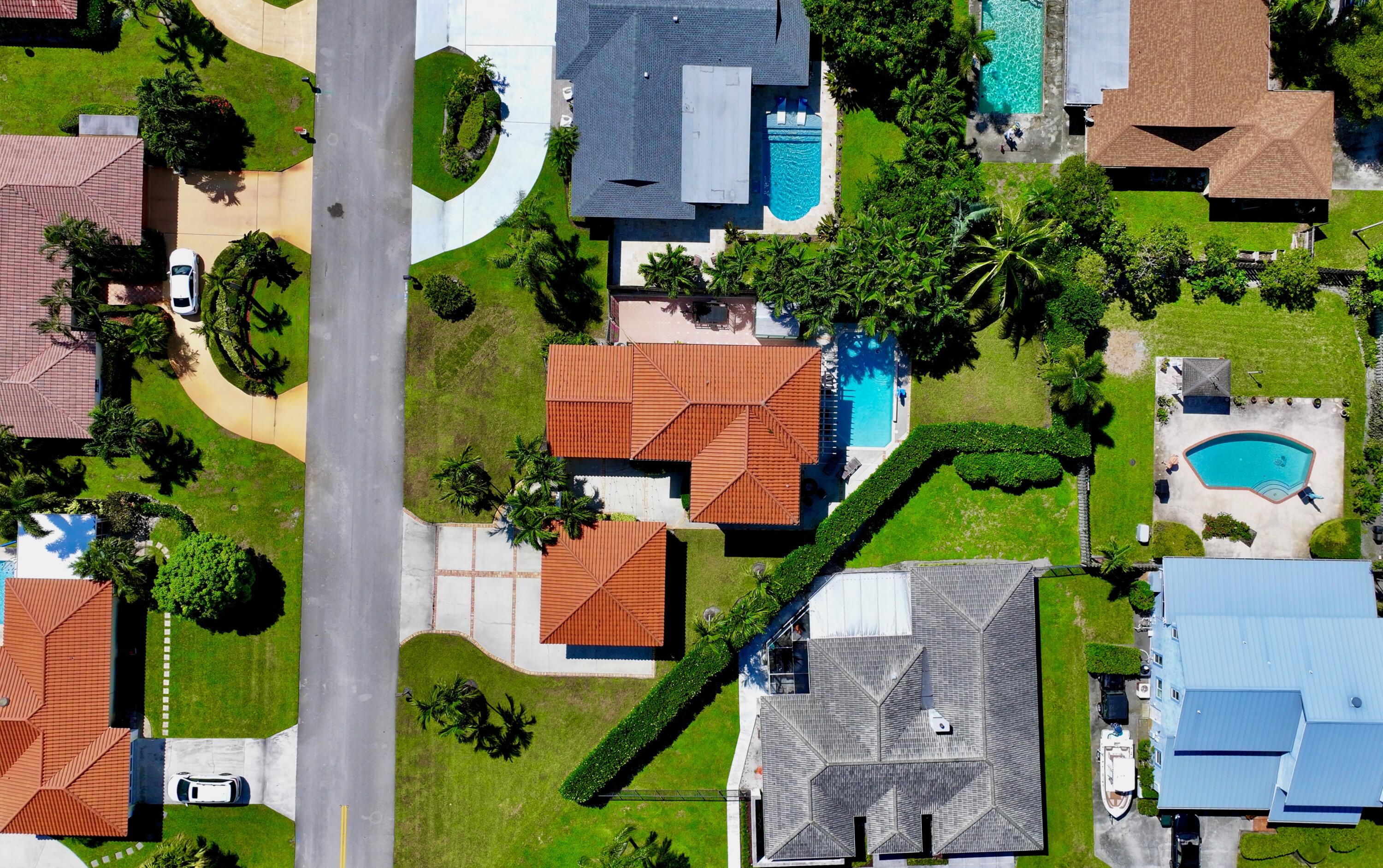 6401 Travis Road West Palm Beach, FL 33406 - Photo 85 of 99 an aerial view of residential houses with outdoor space