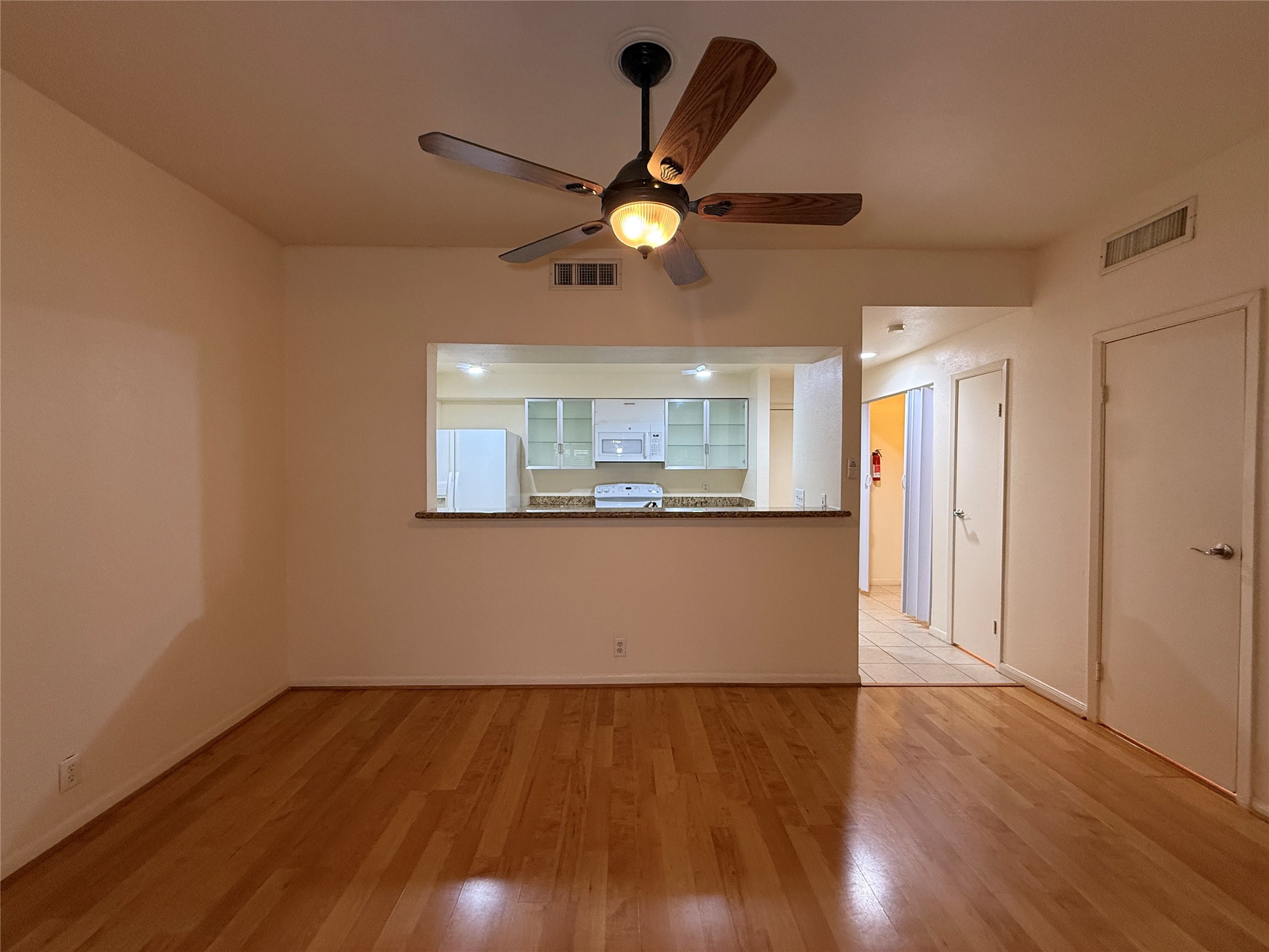 Spacious living room with laminate flooring