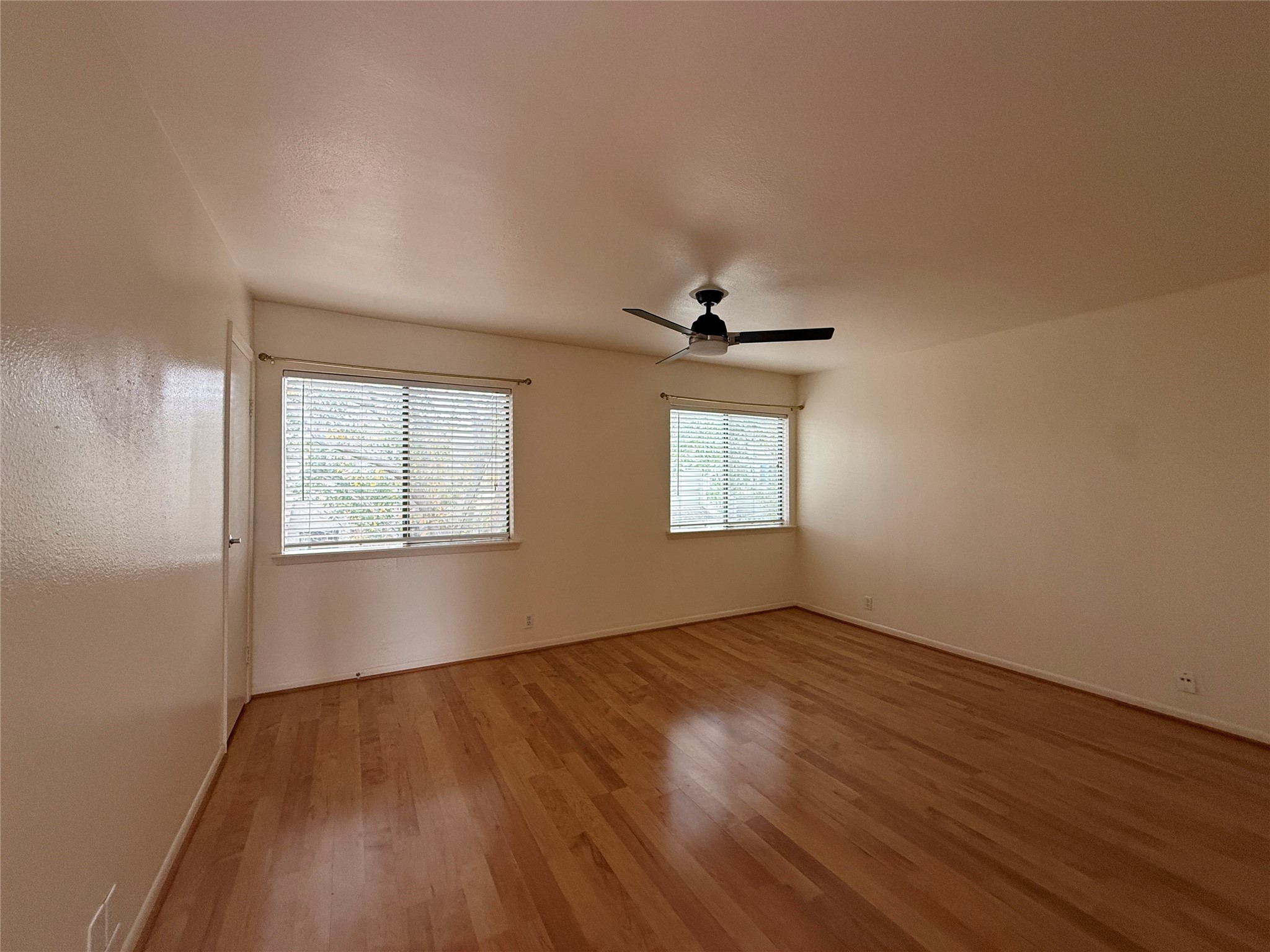 1629 South Kirkwood Road, Unit 202 Houston, TX 77077 - Photo 11 of 25 Primary bedroom with ceiling fan