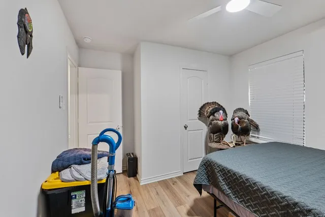 a bed room with furniture and a window