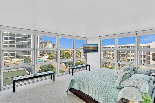 a view of a balcony with chair