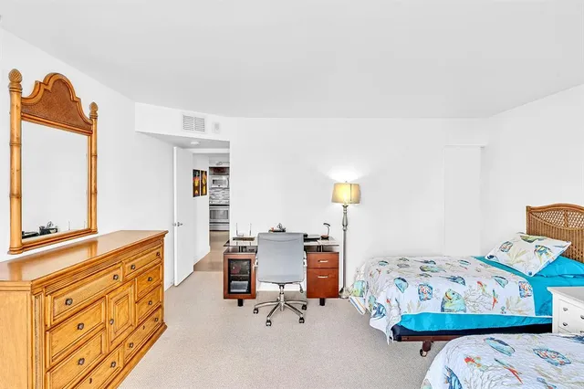 a view of a building with garden and entertaining space