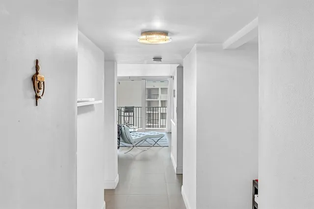 a kitchen with a sink and a stove top oven