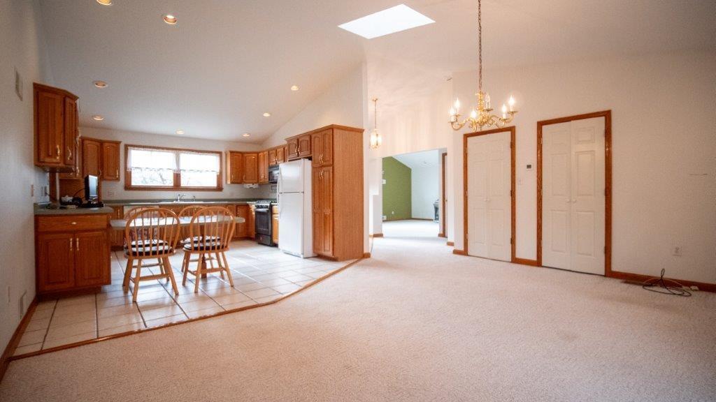 900 Lardintown Road Tarentum, PA 15084 - Photo 32 of 50 a view of a kitchen with refrigerator and chairs