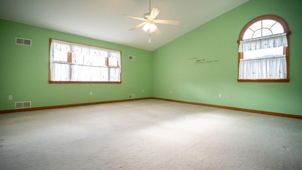 900 Lardintown Road Tarentum, PA 15084 - Photo 36 of 50 an empty room with a window and a fan