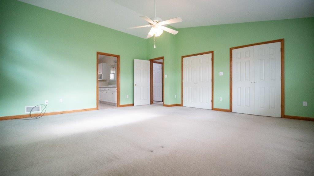 900 Lardintown Road Tarentum, PA 15084 - Photo 37 of 50 an empty room with closet and fan