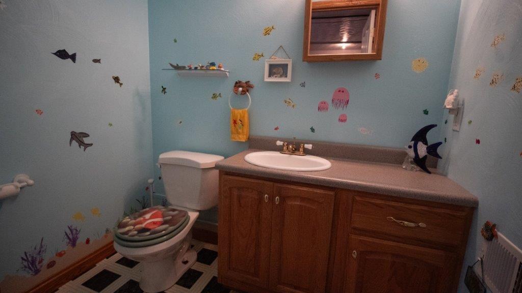 900 Lardintown Road Tarentum, PA 15084 - Photo 42 of 50 a bathroom with a sink toilet and vanity