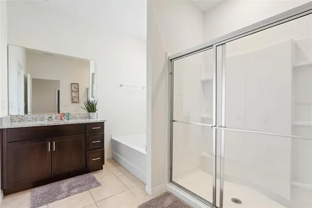 a bathroom with a bathtub and a sink