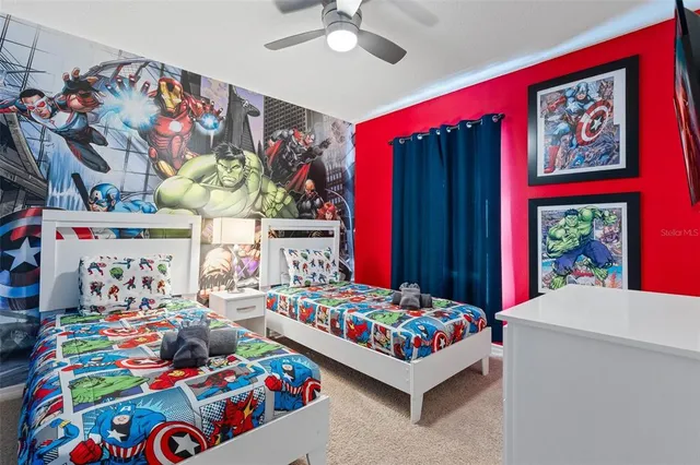 a bedroom with a bed and a couch