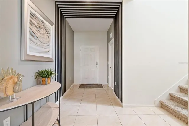 a view of entryway with kitchen