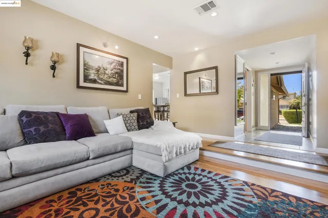 a view of a backyard with a sitting area