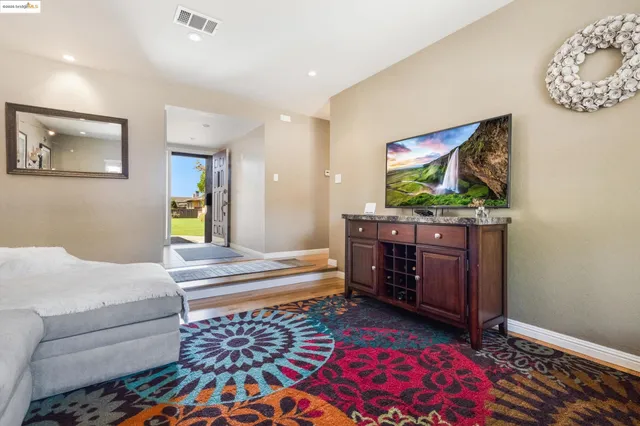 a house view with swimming pool and garden space