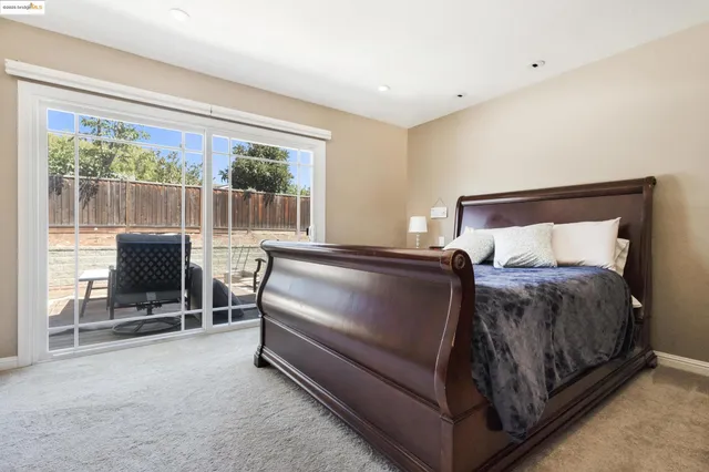 an aerial view of multiple houses with yard