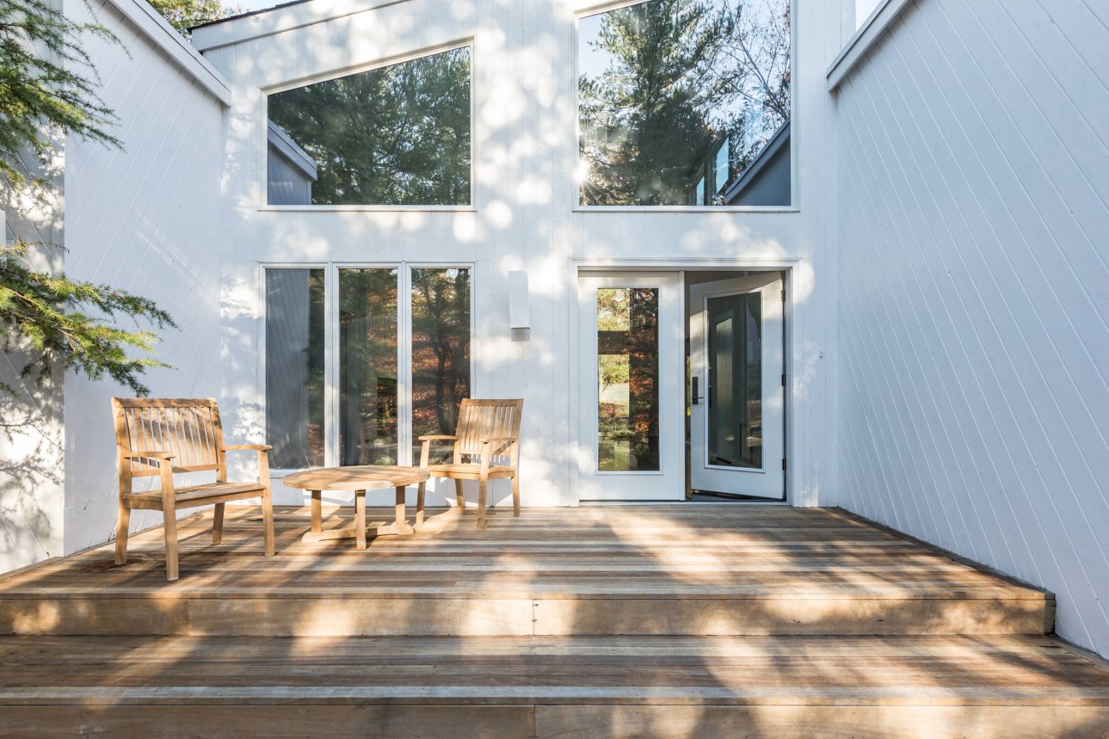 132 Springy Banks Road East Hampton, NY 11937 - Photo 2 of 37 a view of a brick house with a large windows