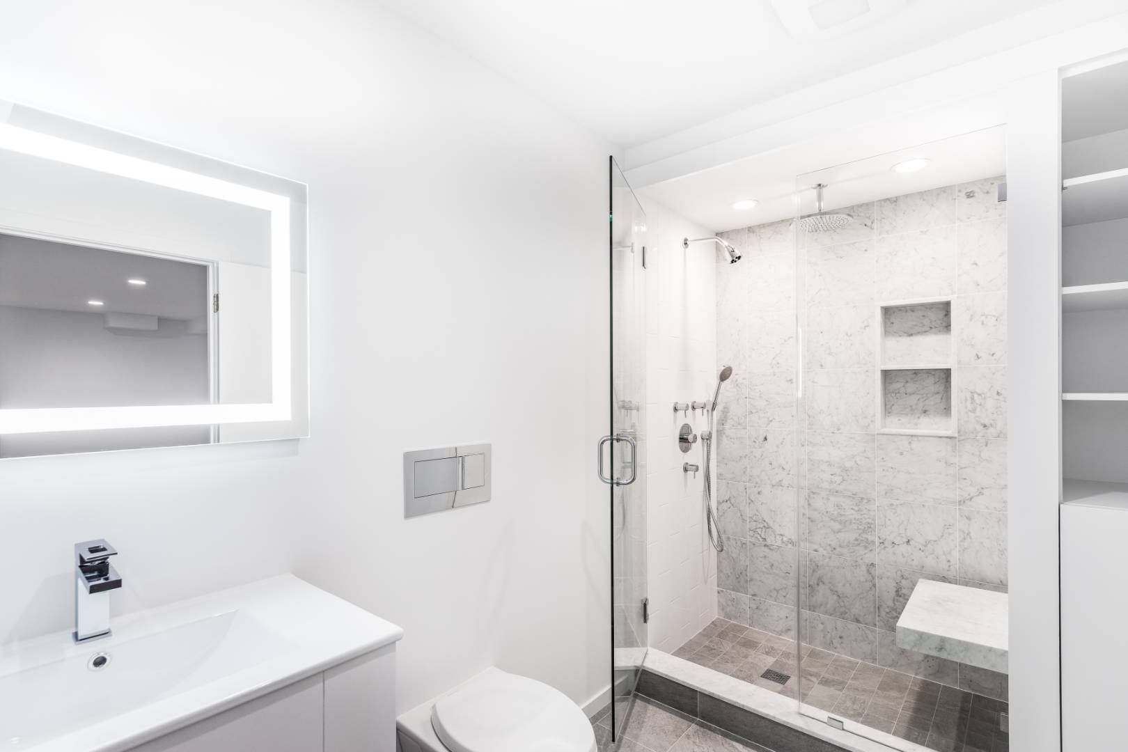 132 Springy Banks Road East Hampton, NY 11937 - Photo 25 of 37 a bathroom with a shower sink vanity and toilet