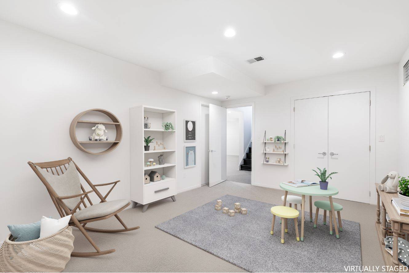 132 Springy Banks Road East Hampton, NY 11937 - Photo 26 of 37 a view of a livingroom with furniture and a chair