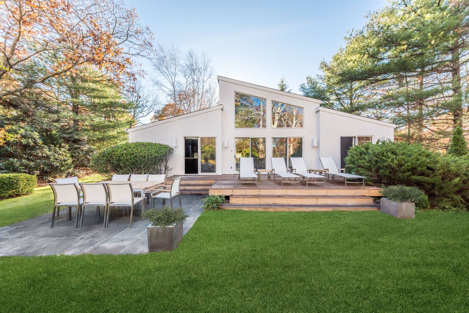 132 Springy Banks Road East Hampton, NY 11937 - Photo 4 of 37 a swimming pool with outdoor seating and yard