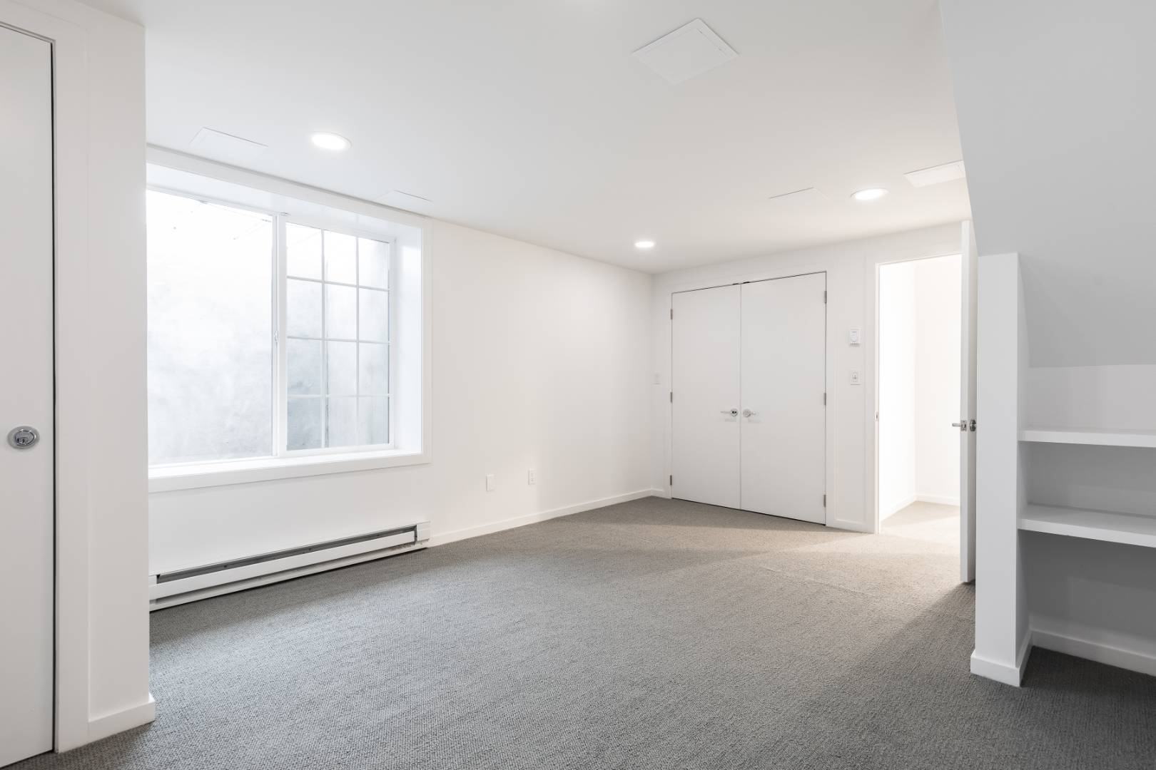 132 Springy Banks Road East Hampton, NY 11937 - Photo 31 of 37 an empty room with windows