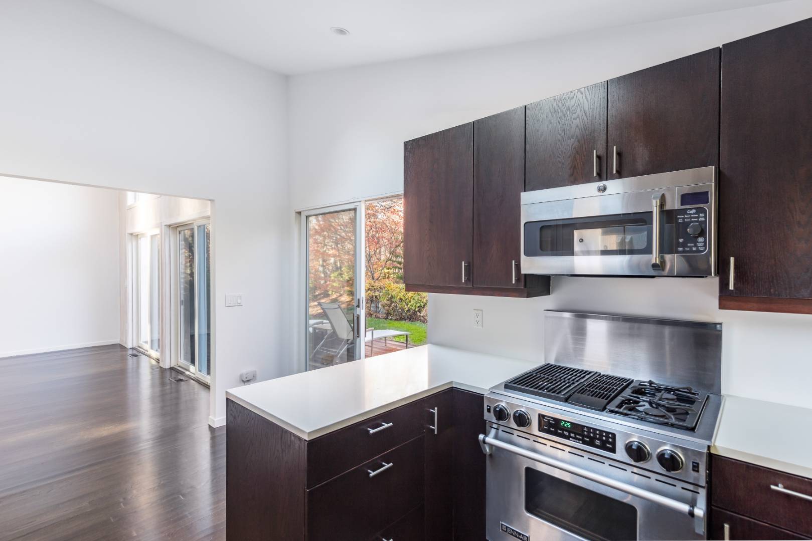 132 Springy Banks Road East Hampton, NY 11937 - Photo 8 of 37 a kitchen with a stove and a microwave