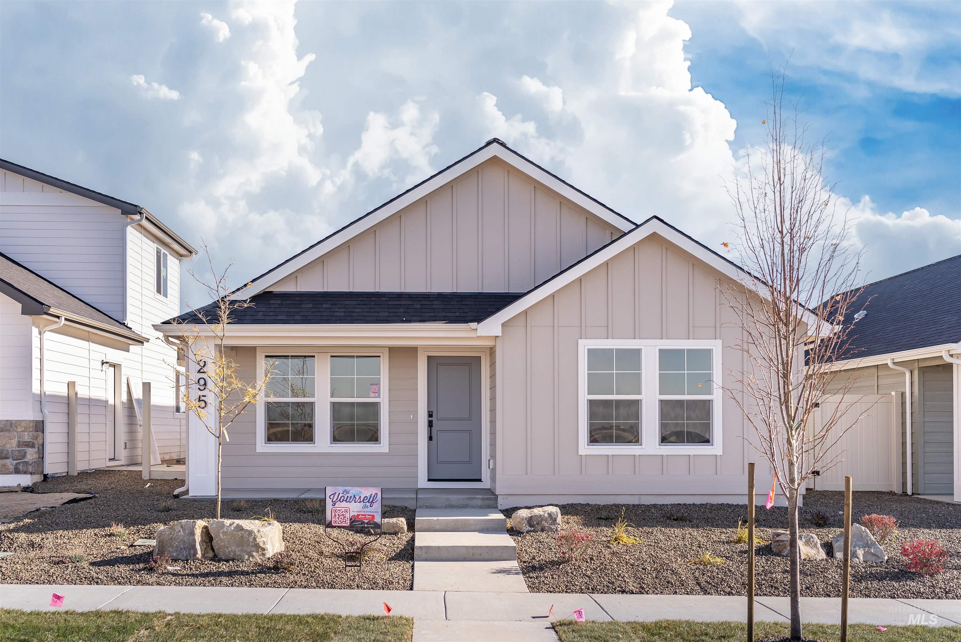 295 East Chevy Drive Boise, ID 83716 - Photo 1 of 1 View of front of house featuring board and batten siding and a shingled roof