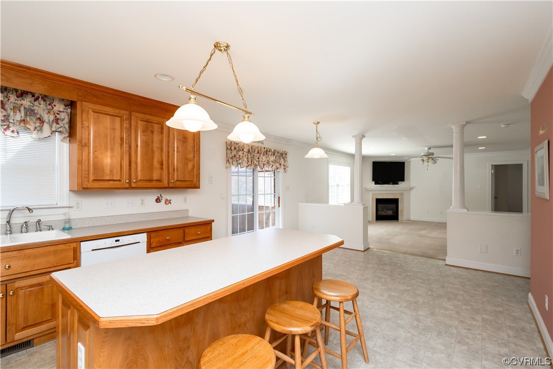 13003 Chipstead Road Chester, VA 23831 - Photo 3 of 38 a kitchen with stainless steel appliances kitchen island granite countertop a sink a stove and a refrigerator