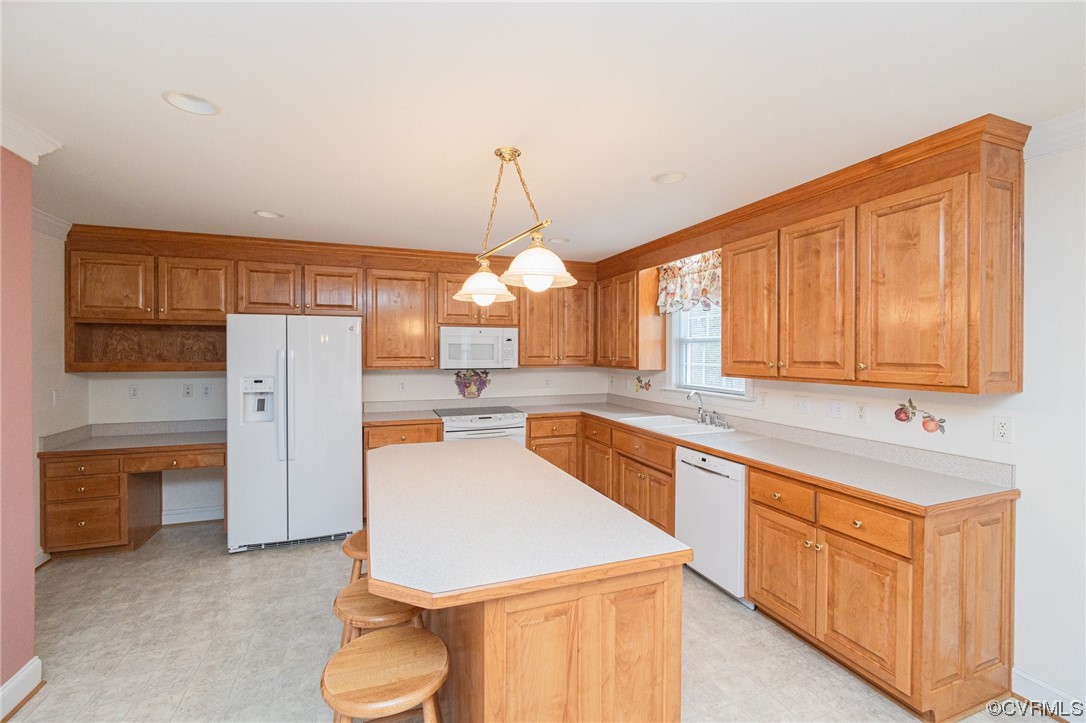 13003 Chipstead Road Chester, VA 23831 - Photo 38 of 38 a kitchen with stainless steel appliances granite countertop a sink a stove cabinets and a dining table
