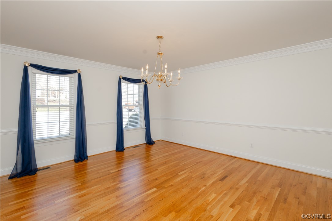 13003 Chipstead Road Chester, VA 23831 - Photo 10 of 38 wooden floor in an empty room with a window