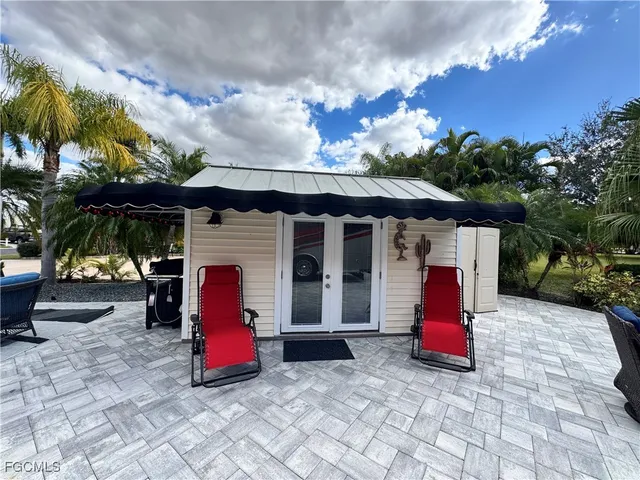 a view of a house with sitting area