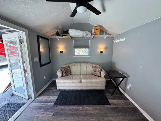 a view of entryway and hallway with a livingroom