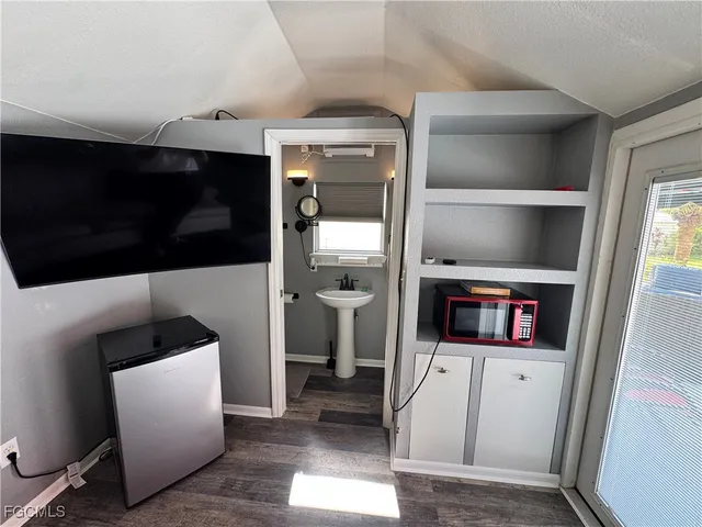 a living room with a couch and a flat screen tv