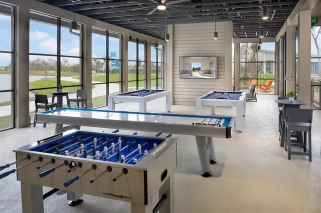 a kitchen with table and chairs