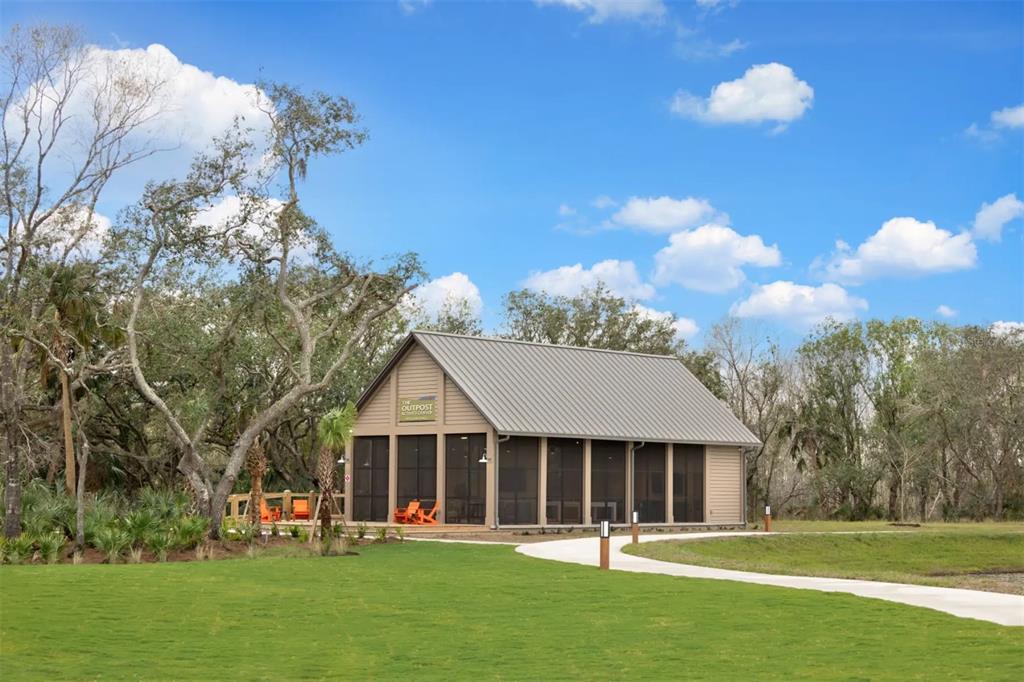11512 Gallatin Trail Parrish, FL 34219 - Photo 39 of 39 a front view of a house with a yard and trees