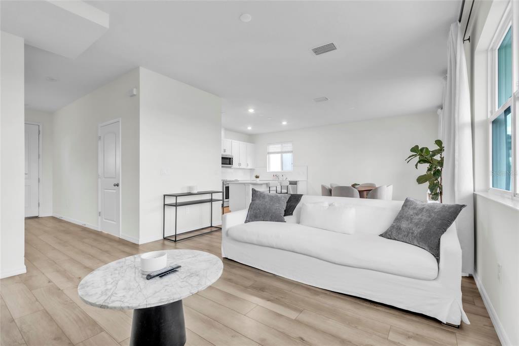11512 Gallatin Trail Parrish, FL 34219 - Photo 9 of 39 a living room with furniture and a table