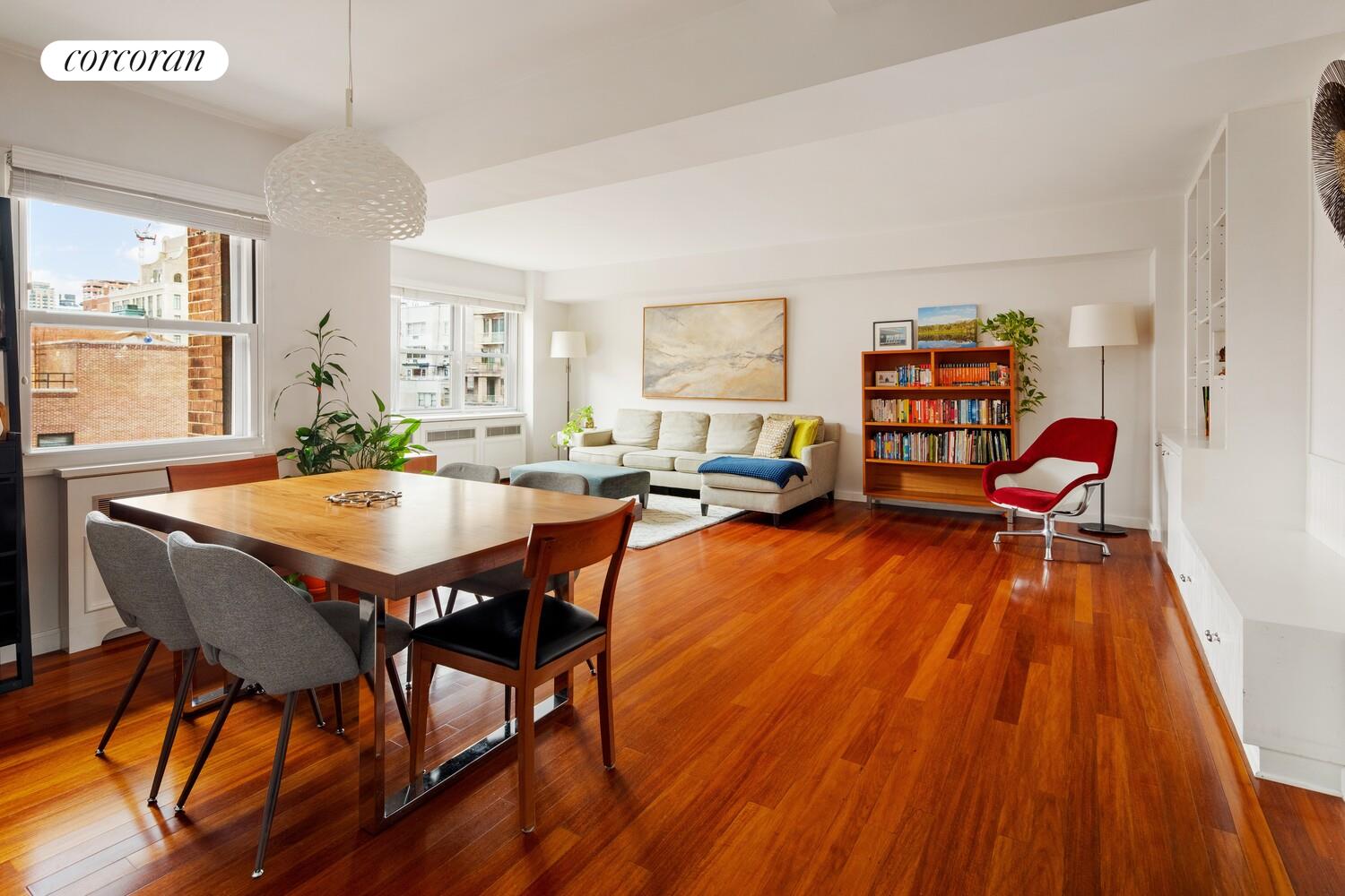 136 East 76th Street, Unit 15B Manhattan, NY 10021 - Photo 3 of 12 a dining room with furniture and wooden floor