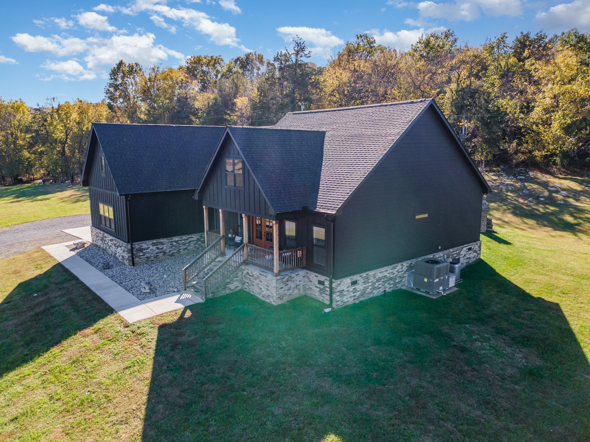 1649 Snake Creek Road Belfast, TN 37019 - Photo 14 of 57 a view of a house with a yard deck and a garden