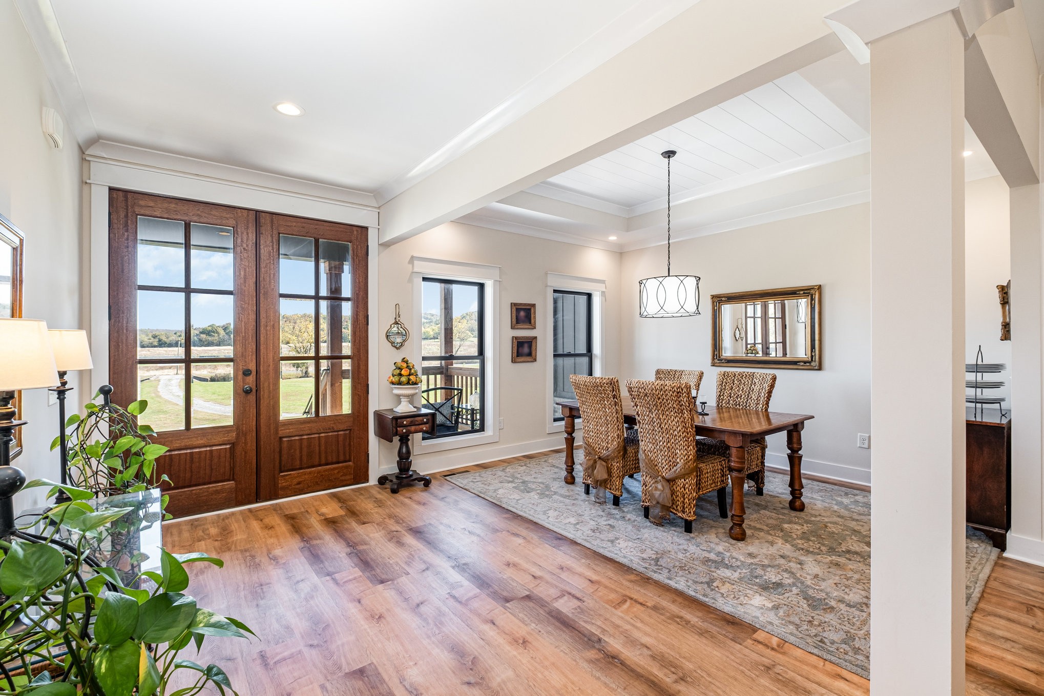 1649 Snake Creek Road Belfast, TN 37019 - Photo 19 of 57 a view of a dining room with furniture window and wooden floor