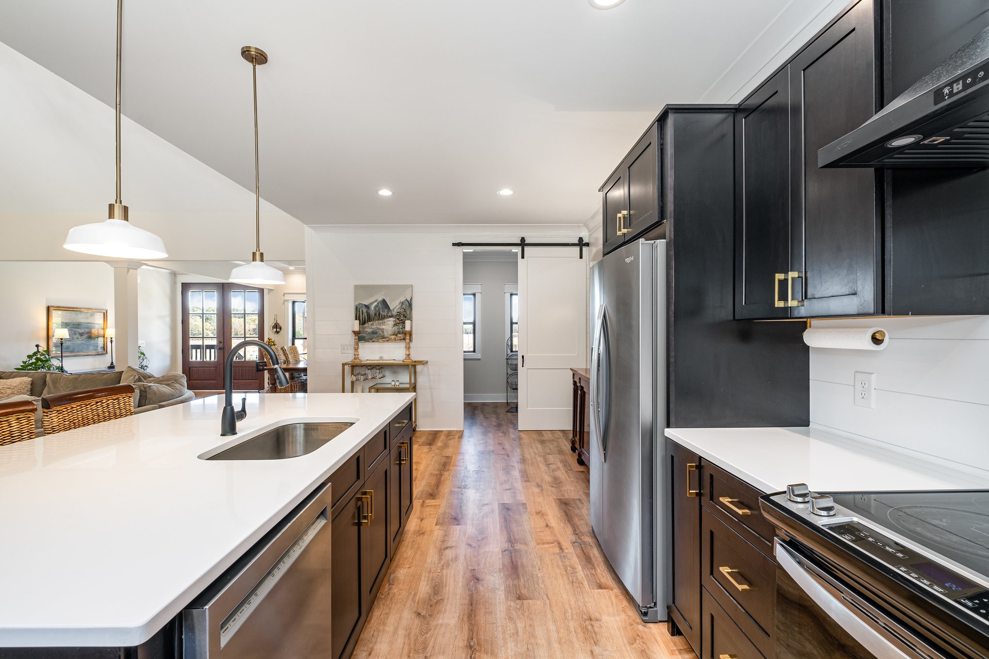 1649 Snake Creek Road Belfast, TN 37019 - Photo 26 of 57 a kitchen with granite countertop a sink a counter space appliances and cabinets
