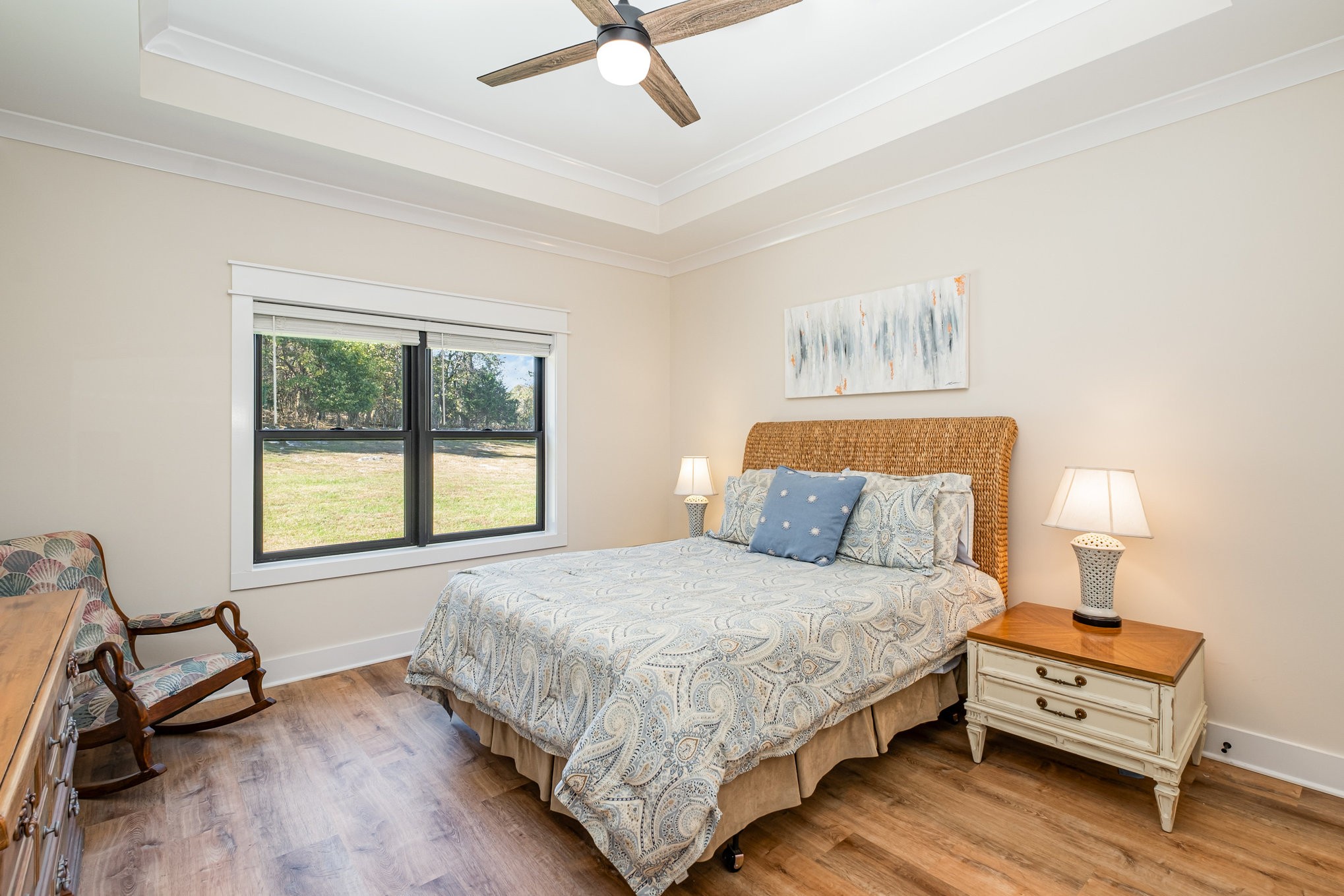 1649 Snake Creek Road Belfast, TN 37019 - Photo 34 of 57 a bedroom with a bed a dresser and a window