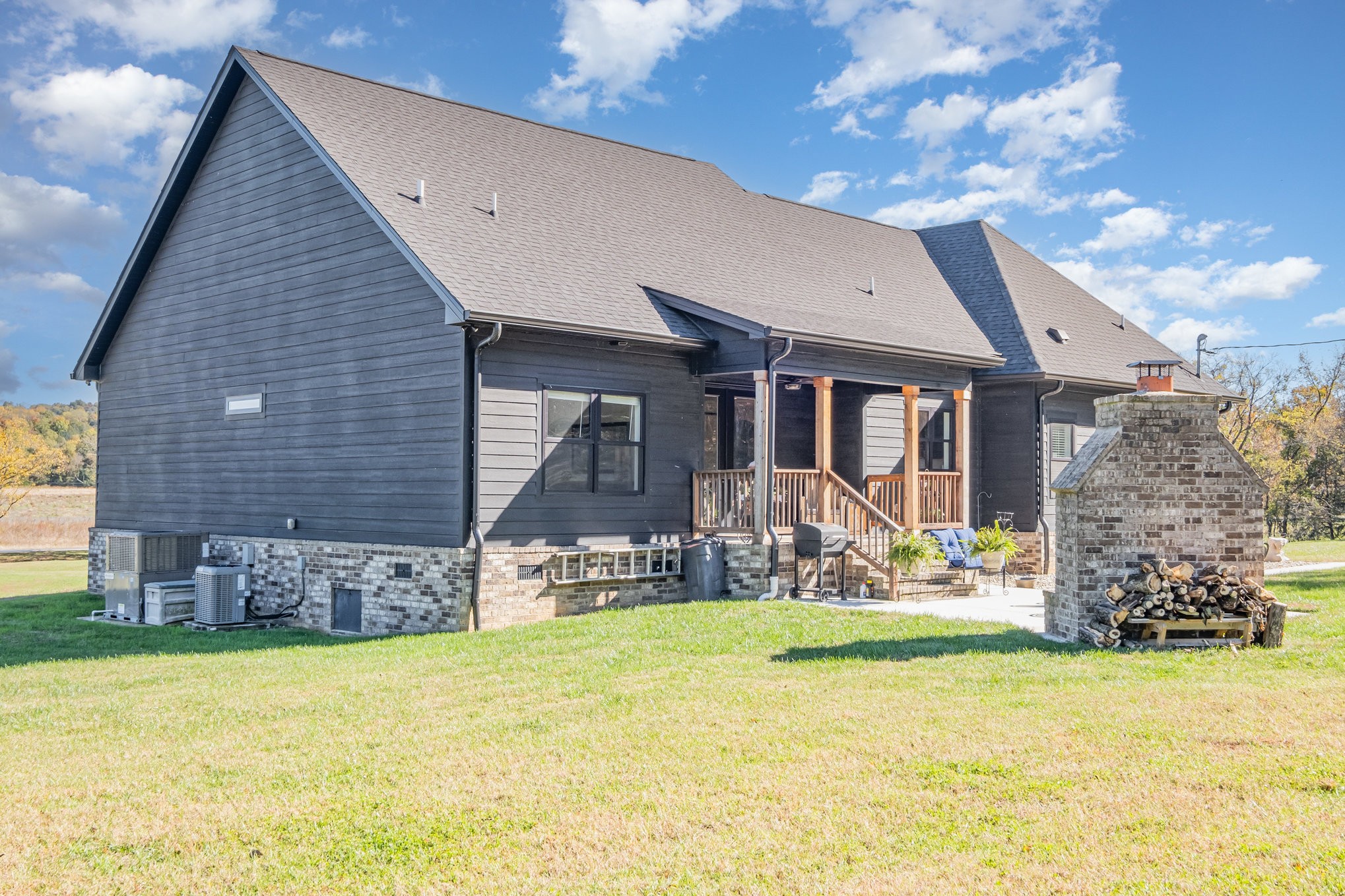 1649 Snake Creek Road Belfast, TN 37019 - Photo 46 of 57 a front view of a house with garden