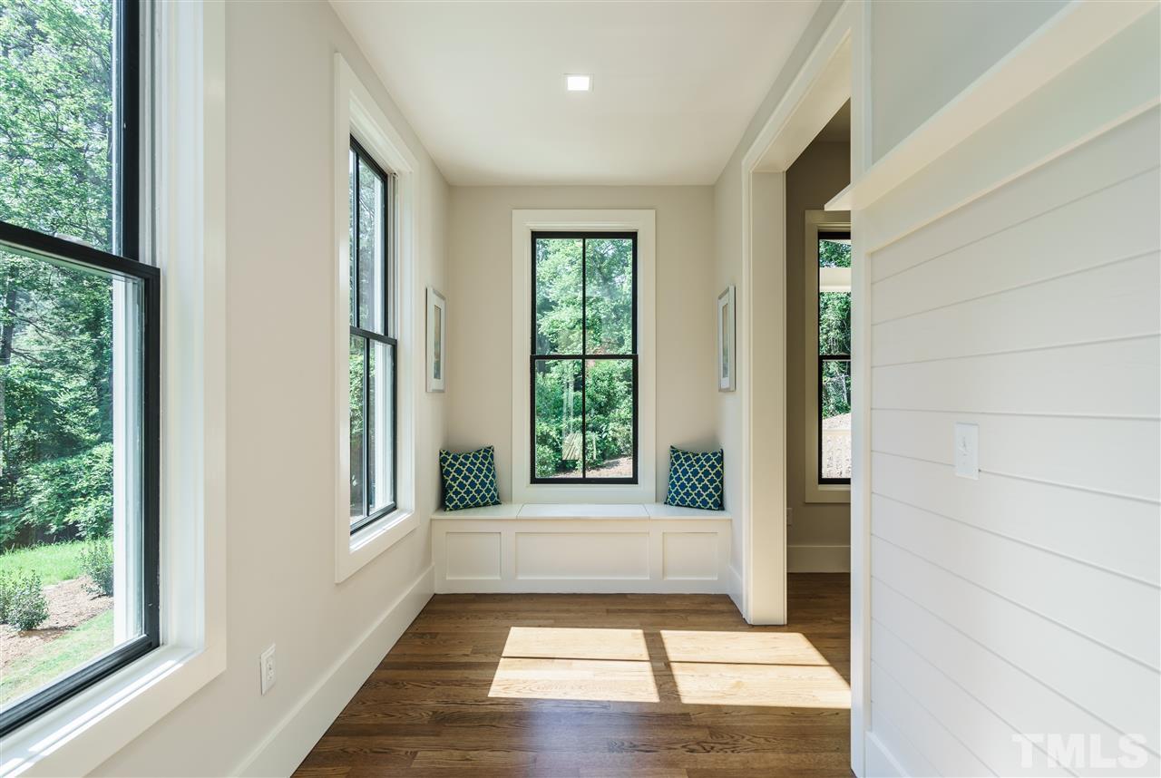 2711 North Mayview Road Raleigh, NC 27607 - Photo 14 of 25 a view of a room with windows and wooden floor