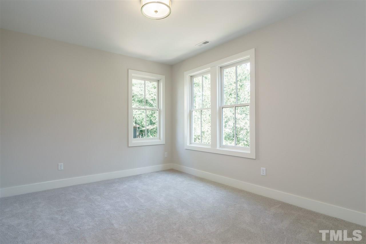 2711 North Mayview Road Raleigh, NC 27607 - Photo 22 of 25 an empty room with windows